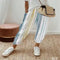 Kelly - Pantalones casuales con estampado multicolor