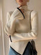 Pull femme à ourlet asymétrique