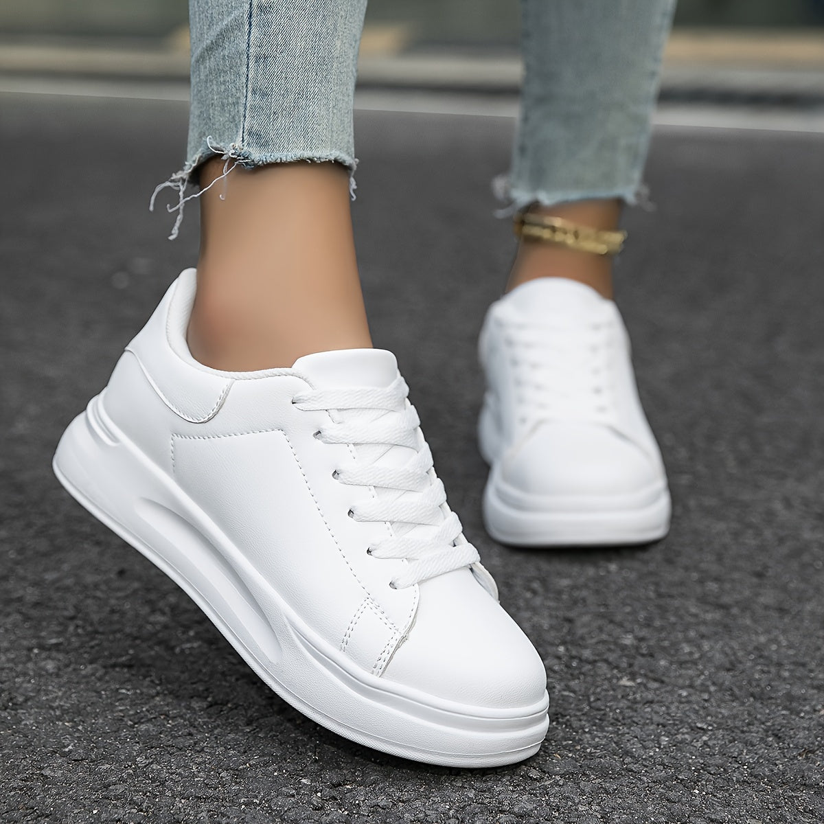 Zapatillas blancas de piel para mujer