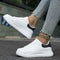 Zapatillas blancas de piel para mujer