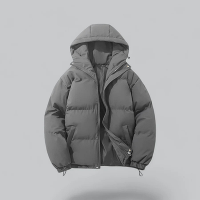 Chaqueta corta unisex con capucha y cierre de cremallera.