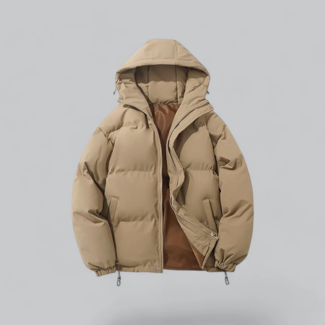 Chaqueta corta unisex con capucha y cierre de cremallera.