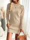 Vestido suéter cálido y elegante con escote redondo. 