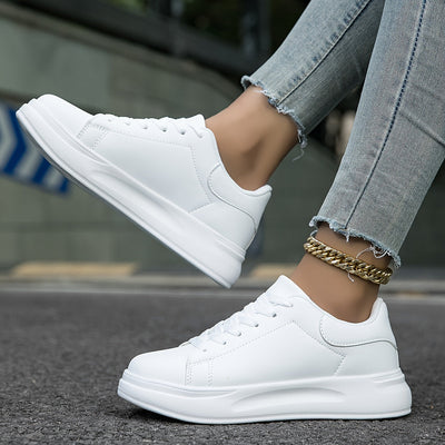 Zapatillas blancas de piel para mujer