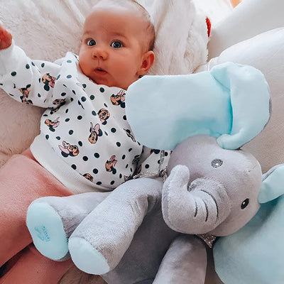 Canta e gioca con i peluche degli elefanti