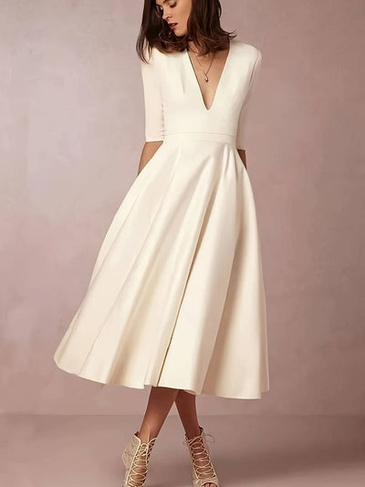 Abito elegante da donna con scollo a V