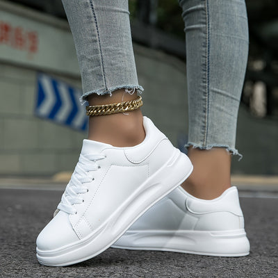 Zapatillas blancas de piel para mujer