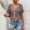 Blusa boho holgada para mujer con mangas de murciélago y cuello en V transpirable.