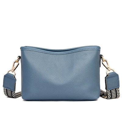 Small Women's Bag de femme avec une grande bandoulière de guitare