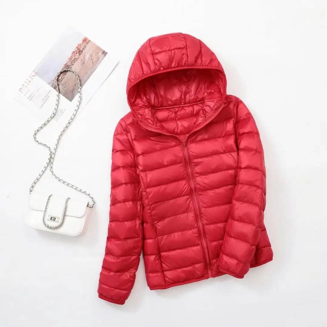 Veste à la baisse des femmes avec capuche