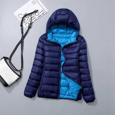 Veste à la baisse des femmes avec capuche