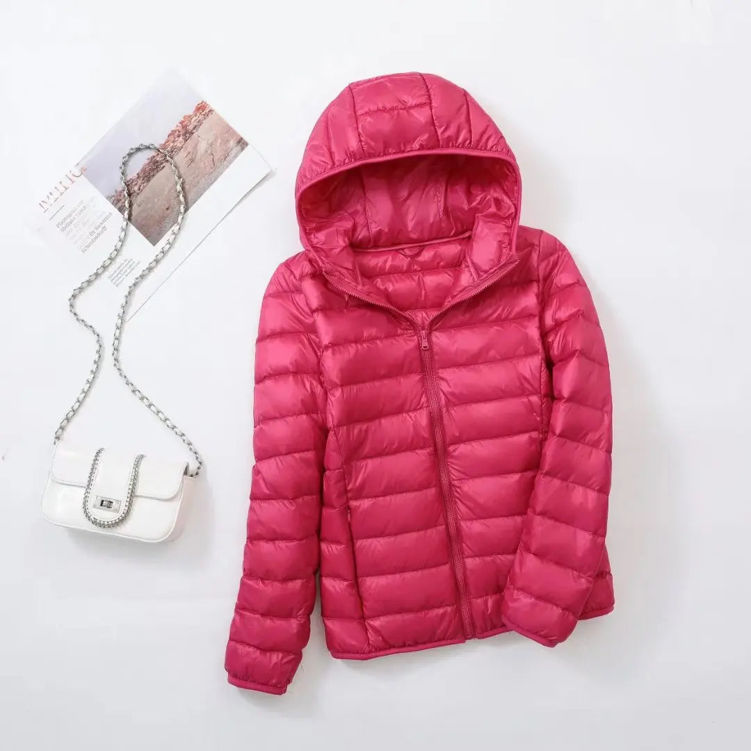 Veste à la baisse des femmes avec capuche