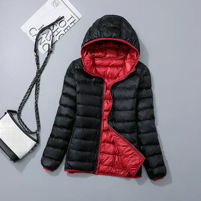 Veste à la baisse des femmes avec capuche