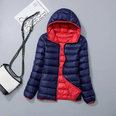 Veste à la baisse des femmes avec capuche