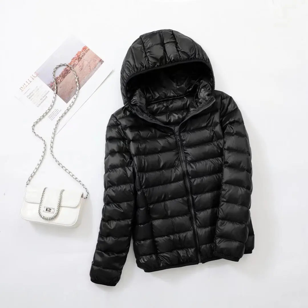 Veste à la baisse des femmes avec capuche