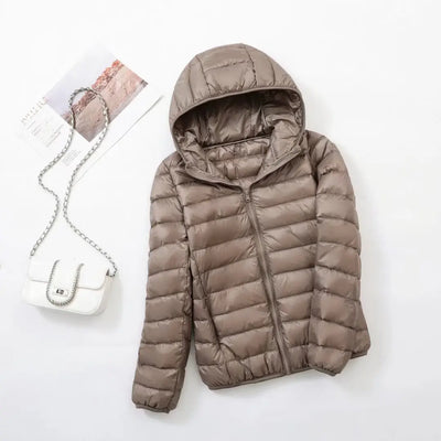 Veste à la baisse des femmes avec capuche
