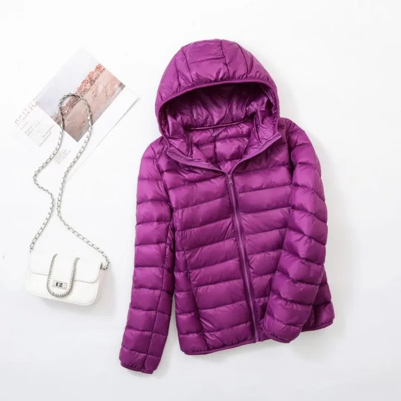Veste à la baisse des femmes avec capuche
