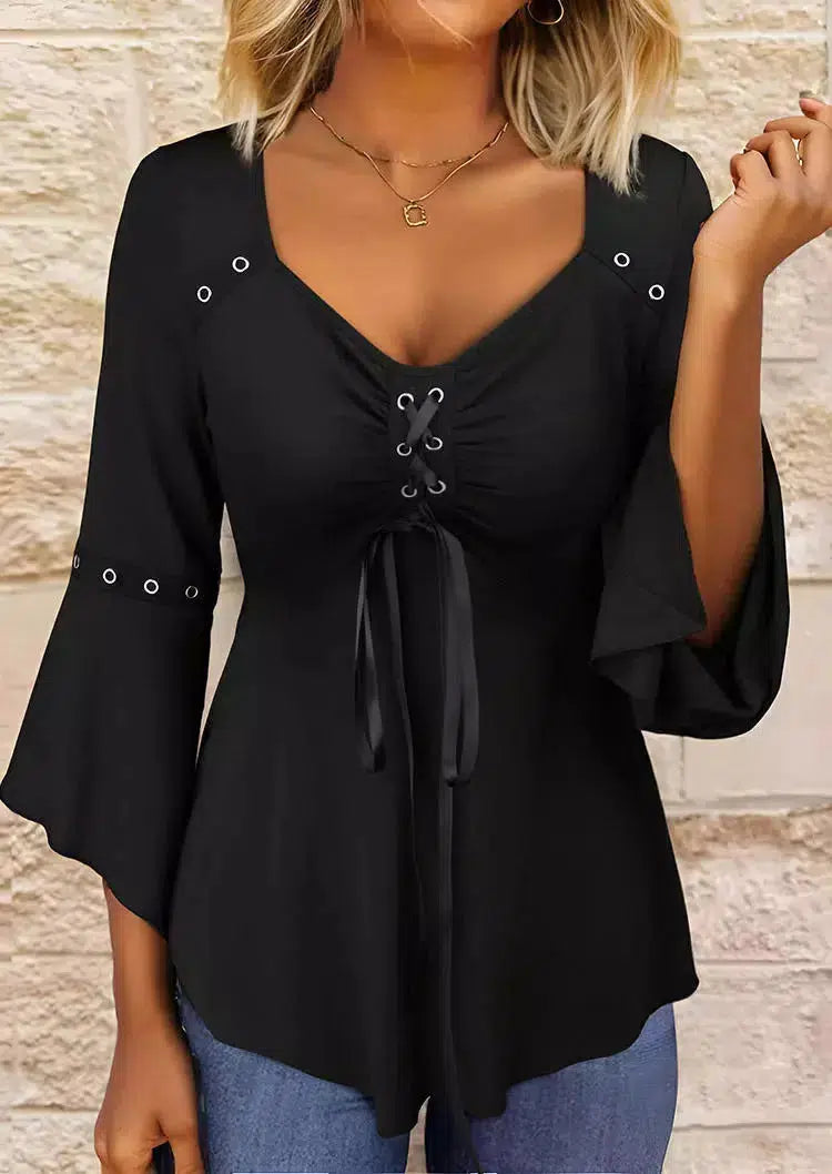 Top noir lisse avec col en V