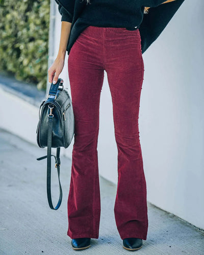 Pantalones acampanados elásticos de cintura alta
