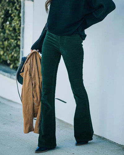 Pantalones acampanados elásticos de cintura alta