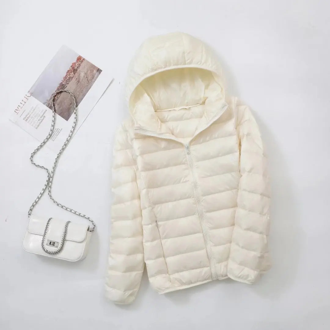 Veste à la baisse des femmes avec capuche