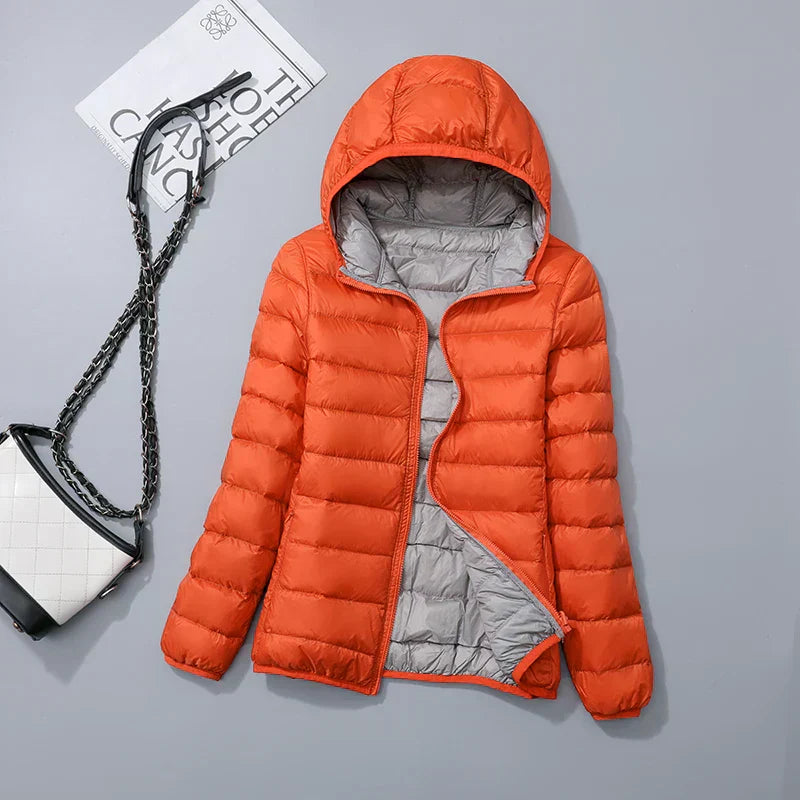 Veste à la baisse des femmes avec capuche