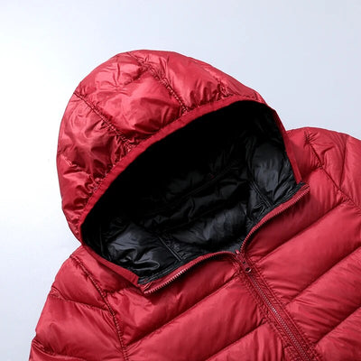 Veste à la baisse des femmes avec capuche