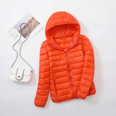 Veste à la baisse des femmes avec capuche