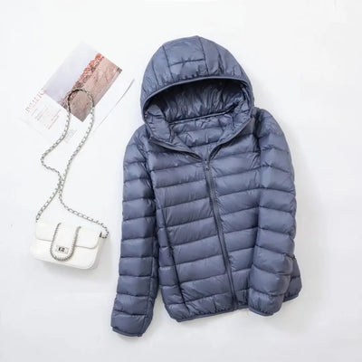 Veste à la baisse des femmes avec capuche