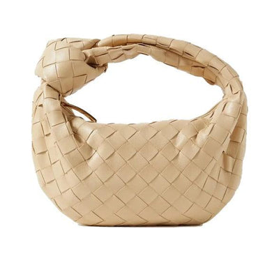 Minibolso elegante y compacto en material de alta calidad.