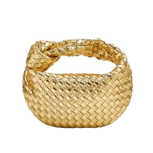 Minibolso elegante y compacto en material de alta calidad.
