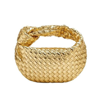 Minibolso elegante y compacto en material de alta calidad.