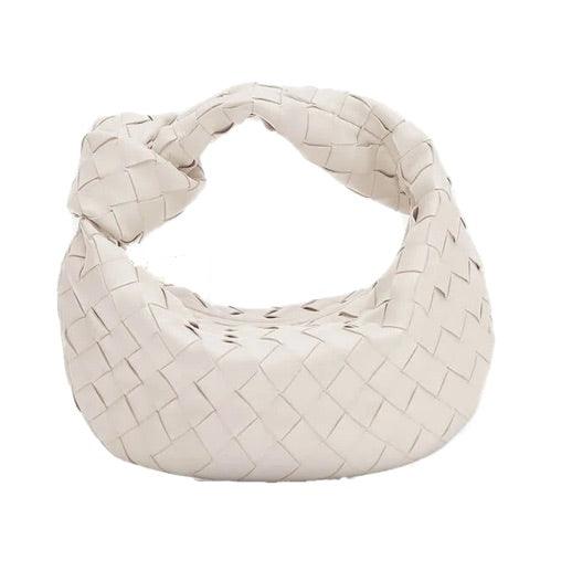 Minibolso elegante y compacto en material de alta calidad.