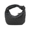 Minibolso elegante y compacto en material de alta calidad.