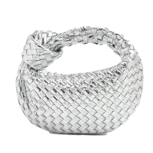 Minibolso elegante y compacto en material de alta calidad.