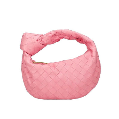 Minibolso elegante y compacto en material de alta calidad.