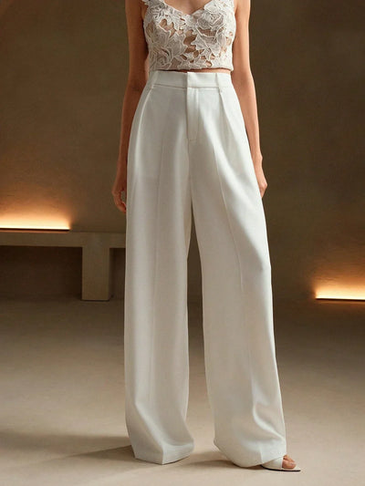 Pantalon taille haute pour femme à larges plis dans un style formel
