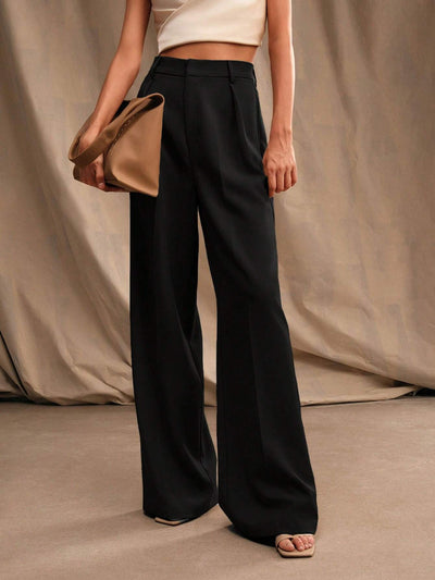 Pantalon taille haute pour femme à larges plis dans un style formel