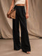 Pantalon taille haute pour femme à larges plis dans un style formel