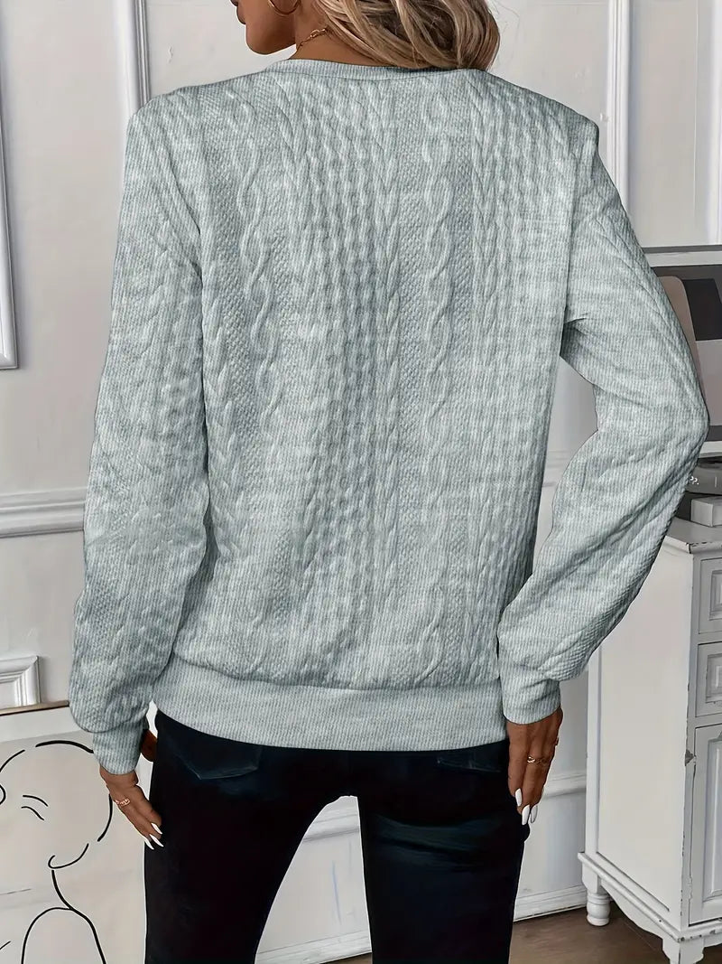 Elegante maglione lavorato a maglia