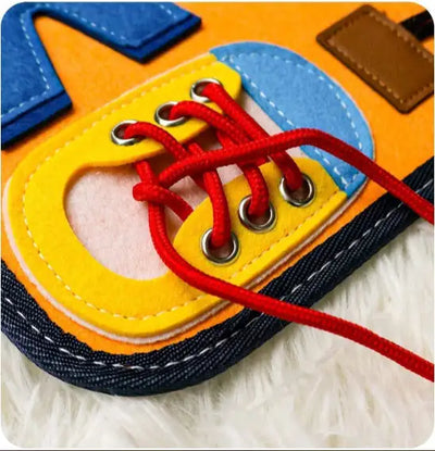 Juguete Montessori de tablero de actividades