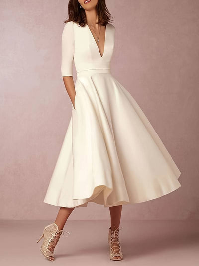 Abito elegante da donna con scollo a V