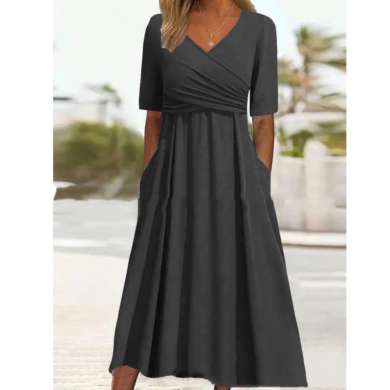 Olivia - Vestido midi negro sencillo con bolsillos laterales