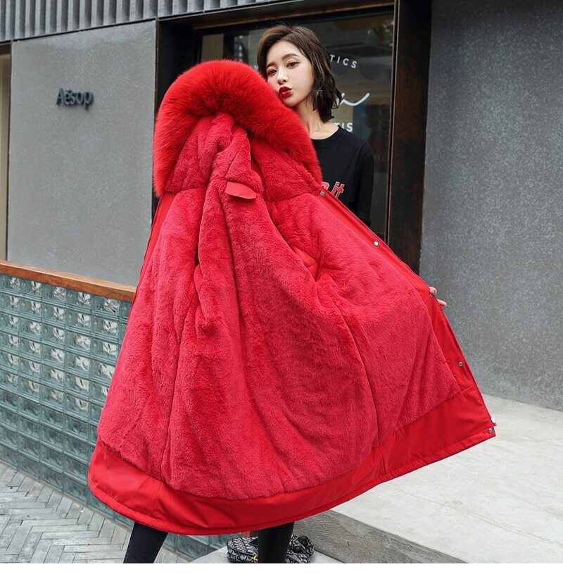 Cappotto da donna con cappuccio e collo di pelliccia