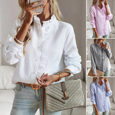 Blusa de mujer elegante larga y manera con cuello alto