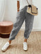Pantalon de détente rayé pour femme