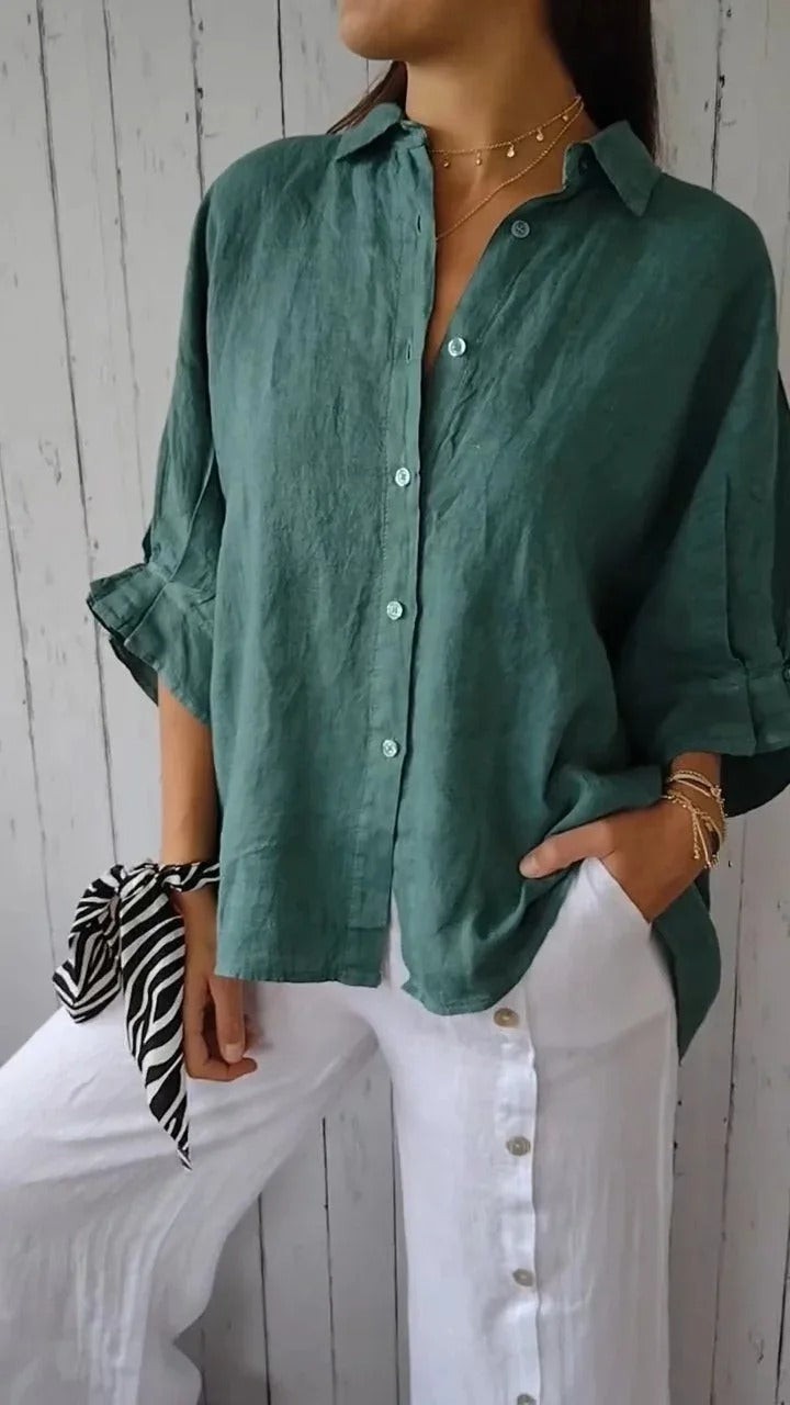 Camisa de mujer 100% lino con mangas largas y corte relajado.