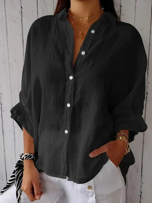 Camisa de mujer 100% lino con mangas largas y corte relajado.