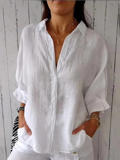 Camisa de mujer 100% lino con mangas largas y corte relajado.