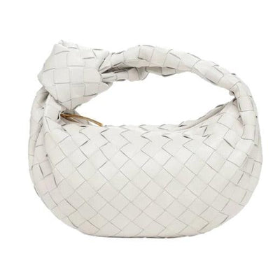 Minibolso elegante y compacto en material de alta calidad.